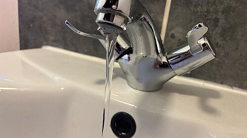 A picture of a running tap 