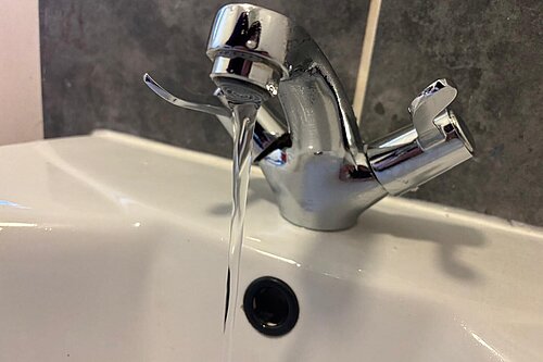 A picture of a running tap 