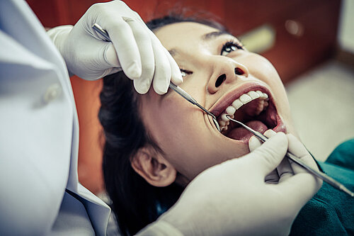 Dentist with patient