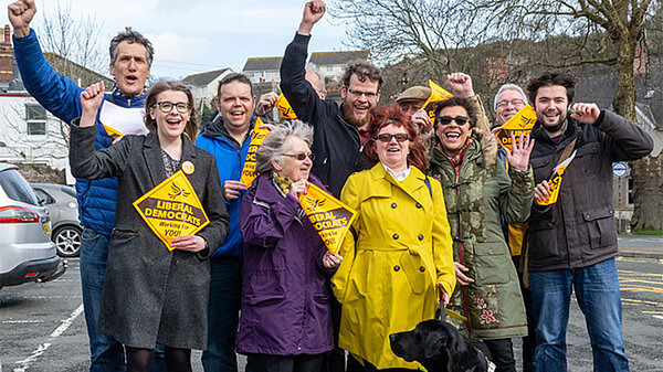 A group of local Lib Dem campaigners in at Torquay Coach Station car park